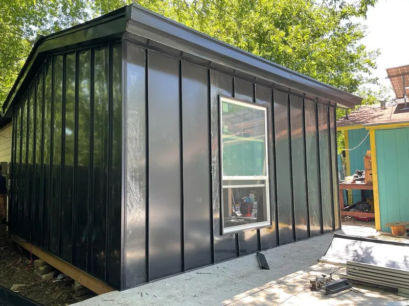 Black standing seam metal wall panels for Metal Roof Installation in West Miami